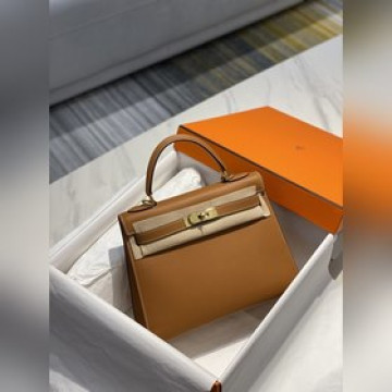 手工蠟線       金棕色愛馬仕在如今的時代已經超越了簡單的身份象征_更