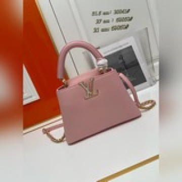 星辰珠光色 貝殼扣 本款 capucines mm 手袋展現 taurillon